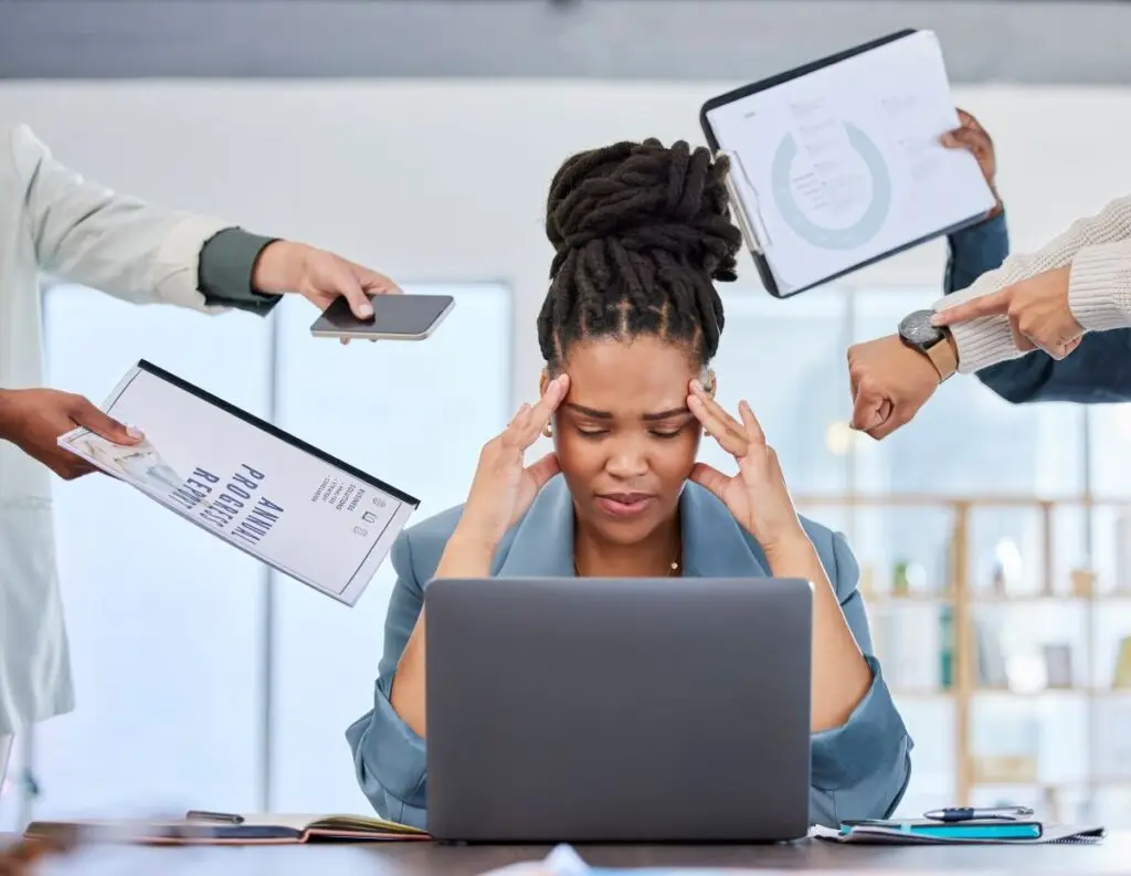 headache-stress-or-black-woman-multitasking-docum-2025-04-06-04-55-36-utc - Exceptional Dentistry