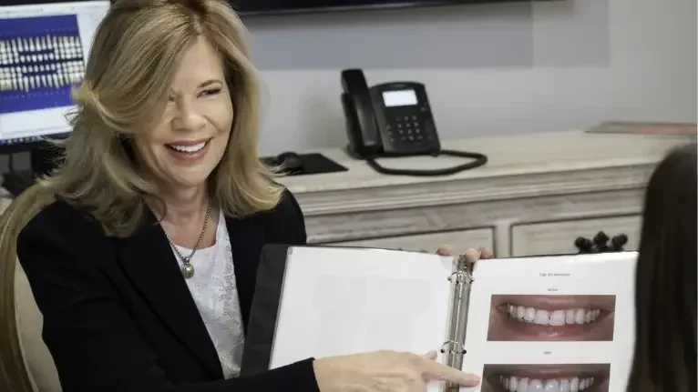 doctor laurie showing pictures of smiles