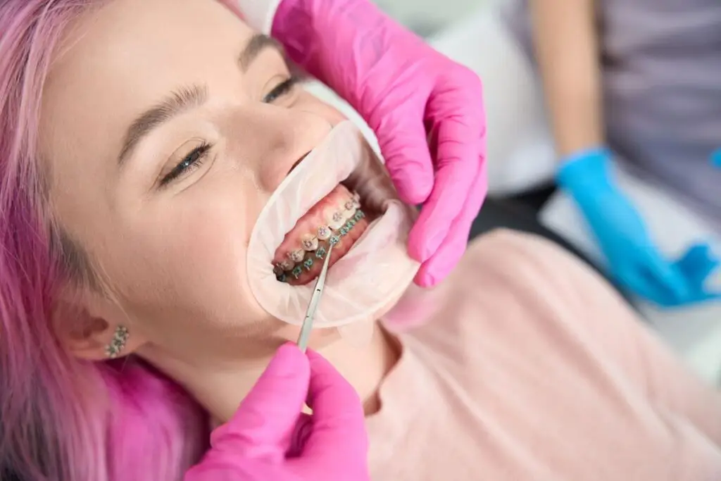 orthodontist checks the system for the correction